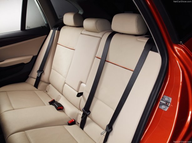 The back seats are nicely detailed, but a bit flat and legroom is tight.  Only a child would fit comfortably in the middle seat.