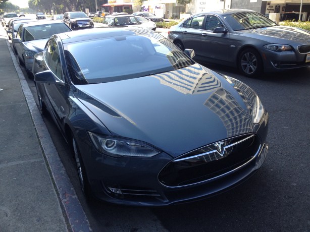 A new 2013 Tesla Model S enjoys Doris Day parking at BOA Steakhouse in West Hollywood.