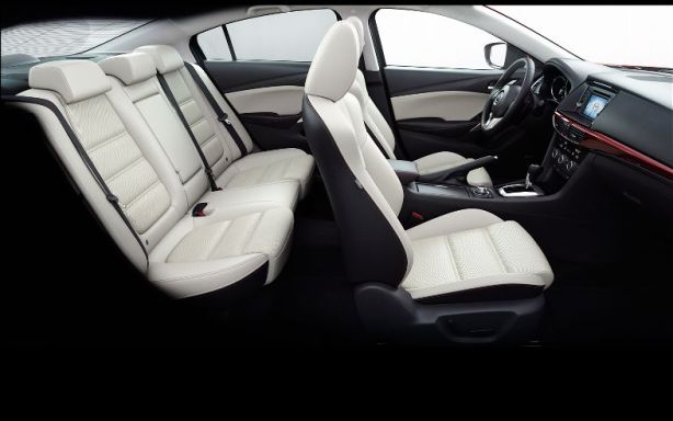 This is the "Almond" interior. It looks off-white in person and while I like it, I think it would show dirt quickly.