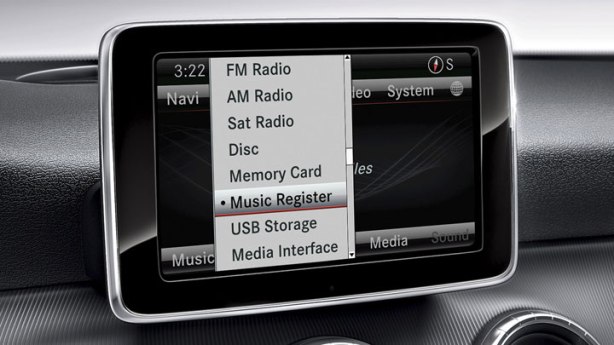 The upgraded 7" tablet-style screen with the Multimedia package controls all the infotainment function by a rotary controller just below the center armrest. 