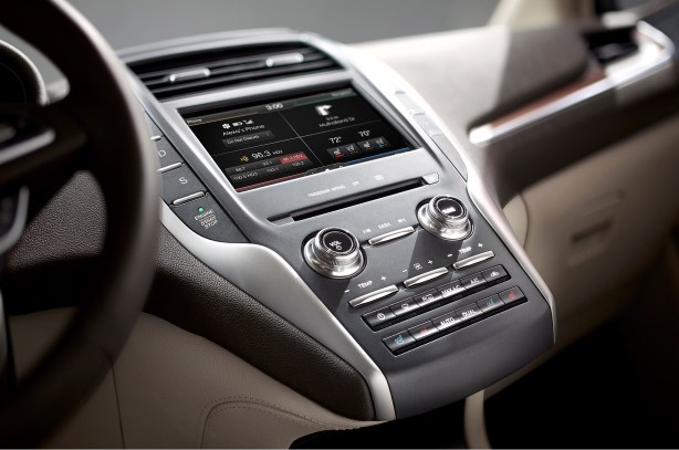 The latest-generation MyLincoln Touch system sees the return of round knobs and physical buttons to replace the touch controls found in the MKZ.  It's unclear if the 2015 MKZ will adopt these changes, but it's likely.