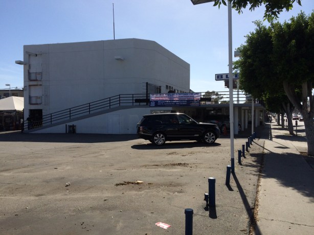 The sad sack building and nearly empty parking lot tell a story. 
