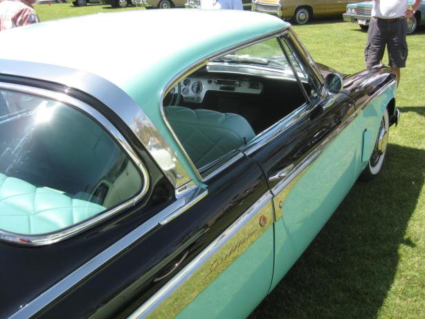 The turquoise and black color scheme of the Studebaker Hawk is wild. 