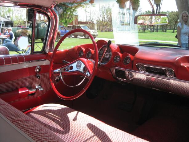 You just don't see interiors like this anymore. Everything matches the exterior color. Check out cast steel gauge cluster. You don't want to hit your head on this! Hard to find hounds-tooth fabric in a car anymore.