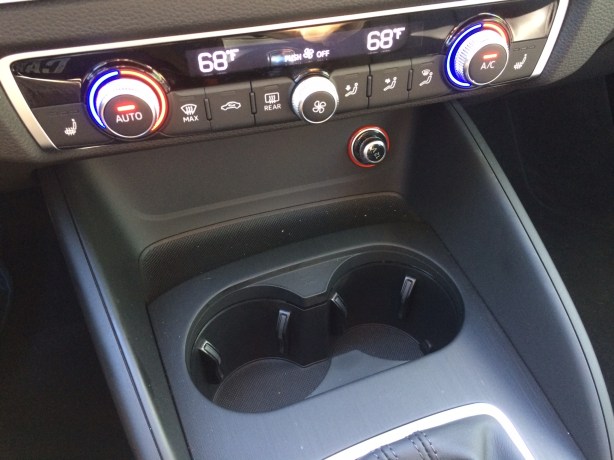 The cup holders are too close to the HVAC controls. No Big Gulps here. Also the power port should be moved away from the cup holders. Bad placement.